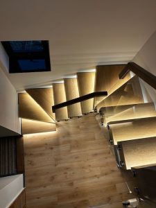 Centre spine staircase with steel mono stringer and oak treads