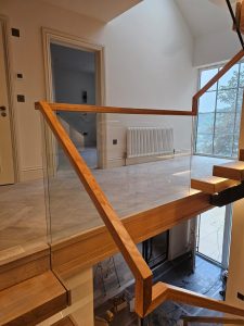 Detail of welded centre spine supporting solid timber treads